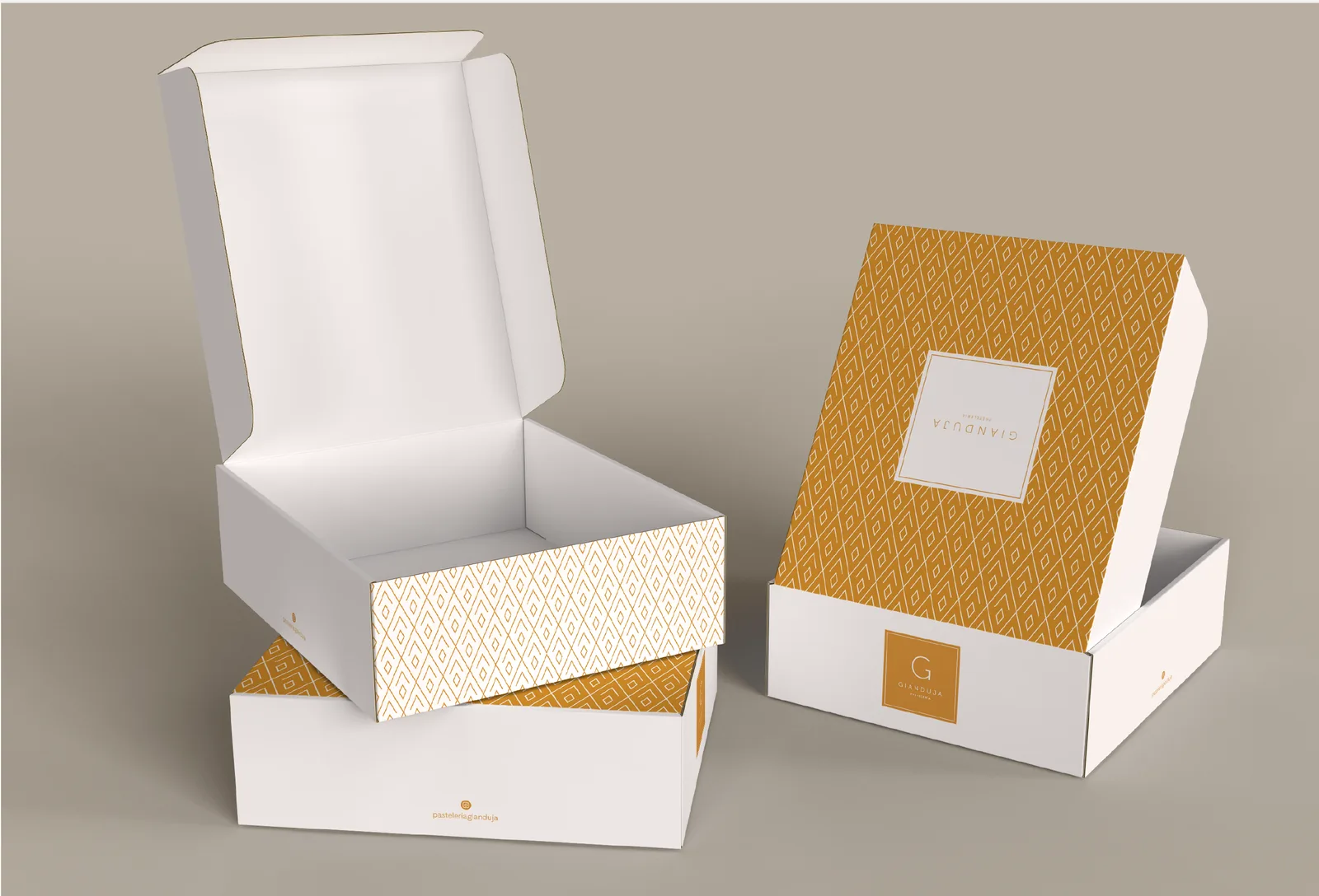 Cajas de packaging de Gianduja con la trama dorada y el monograma